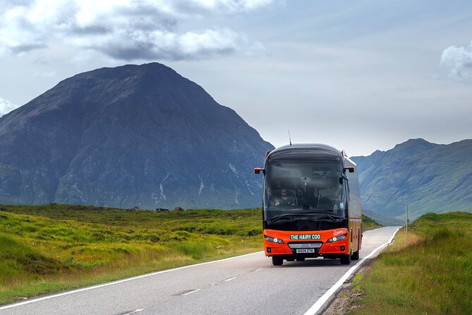 Glenfinnan, Glencoe and Scottish Highlands Day Tour - Commando Memorial: a darker pause with strong mountain views