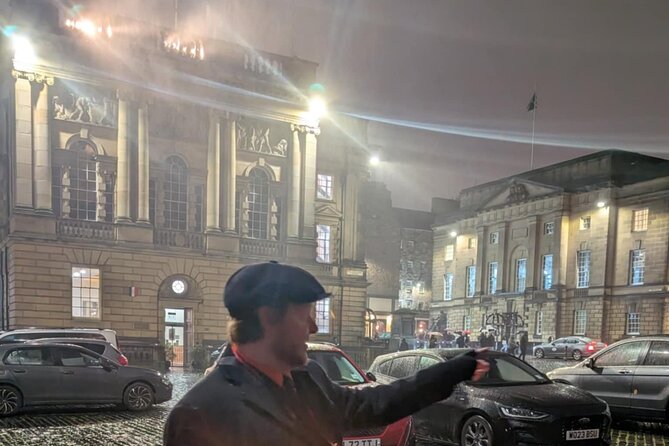 Haunted Histories walking Tour - Stop 3: Mercat Cross and the Dark Entertainment Question
