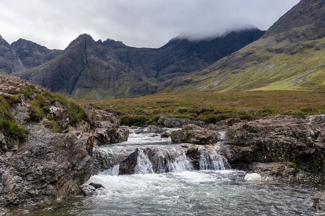 Skye Day Tour from Inverness with Fairy Pools & Dunvegan Castle - Portree for 45 minutes: lunch, supplies, and that harbor postcard feeling